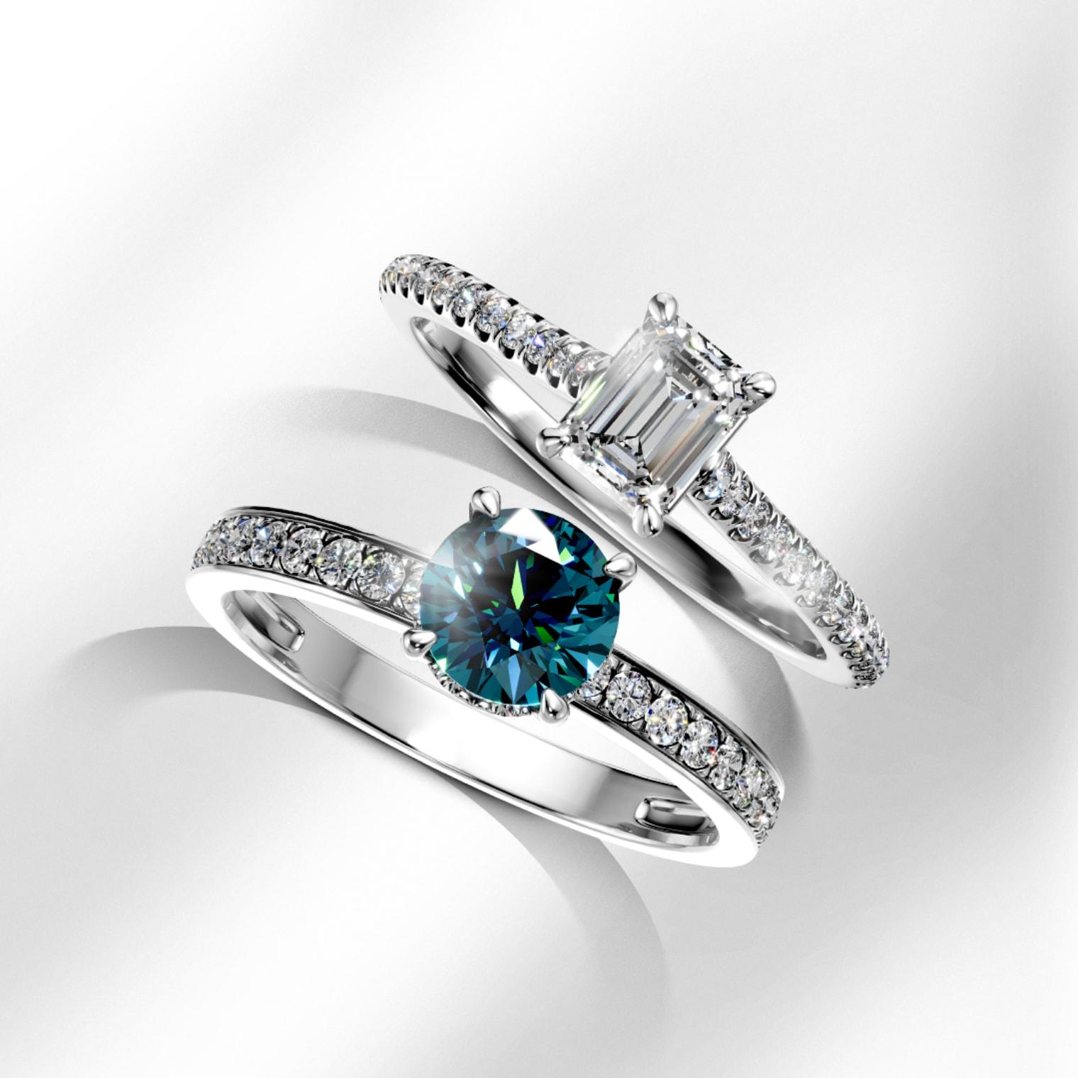 Inel de logodna din platina 18K cu diamant Emerald, si inel de logodna aur alb 18K cu diamant albastru rotund - TEILOR